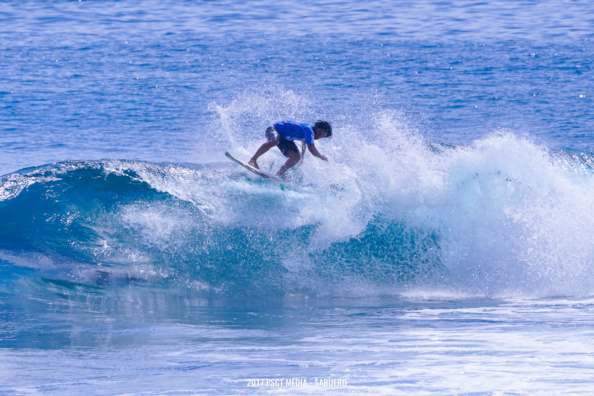 One of the surfers from Round 4 finishes a wave by doing a floater on his backside. Photo by Gaps Sabuero