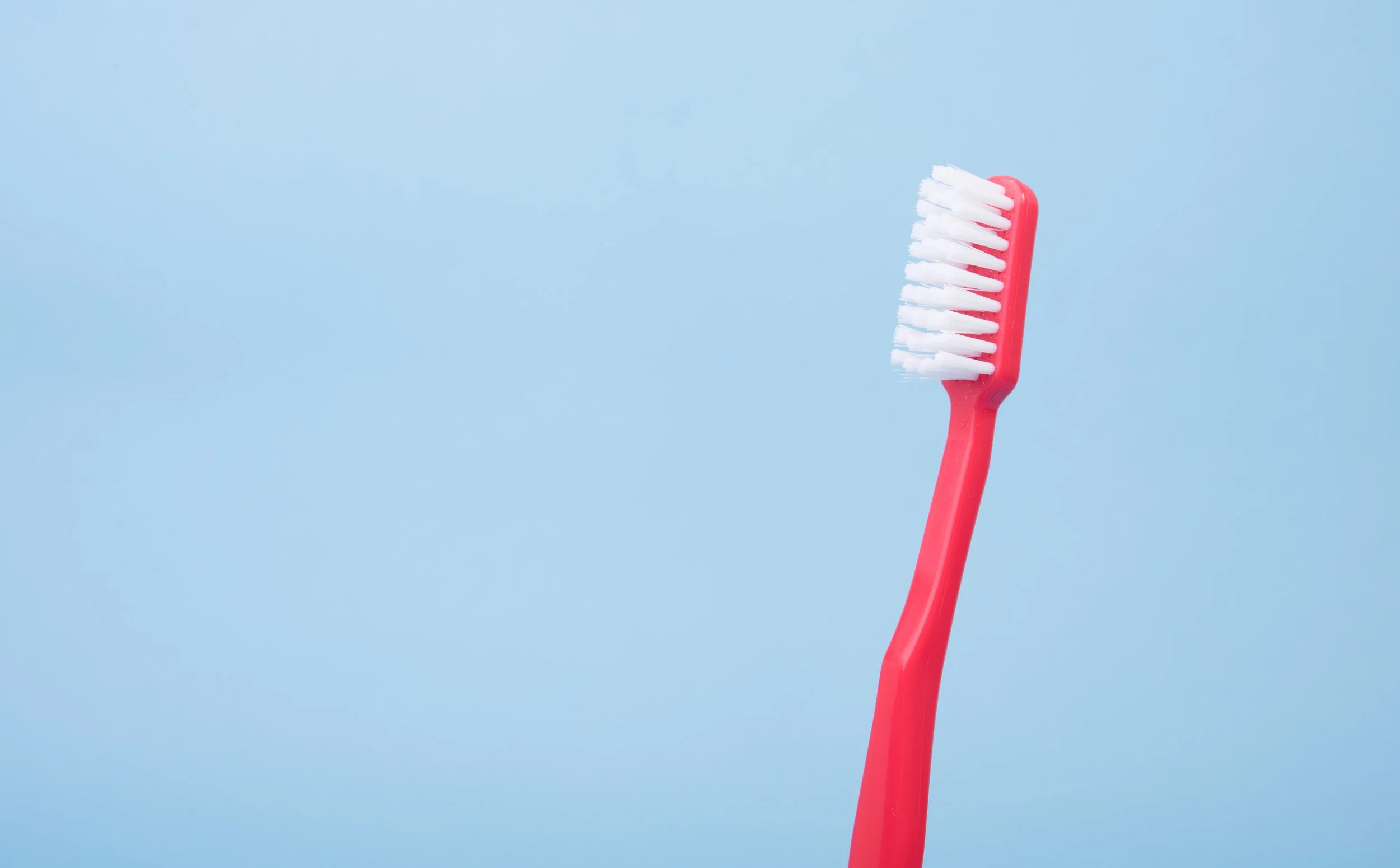 Plastic toothbrushes don't decompose. Get a biodegrable one that doesn't add to the growing pile in our landfills.