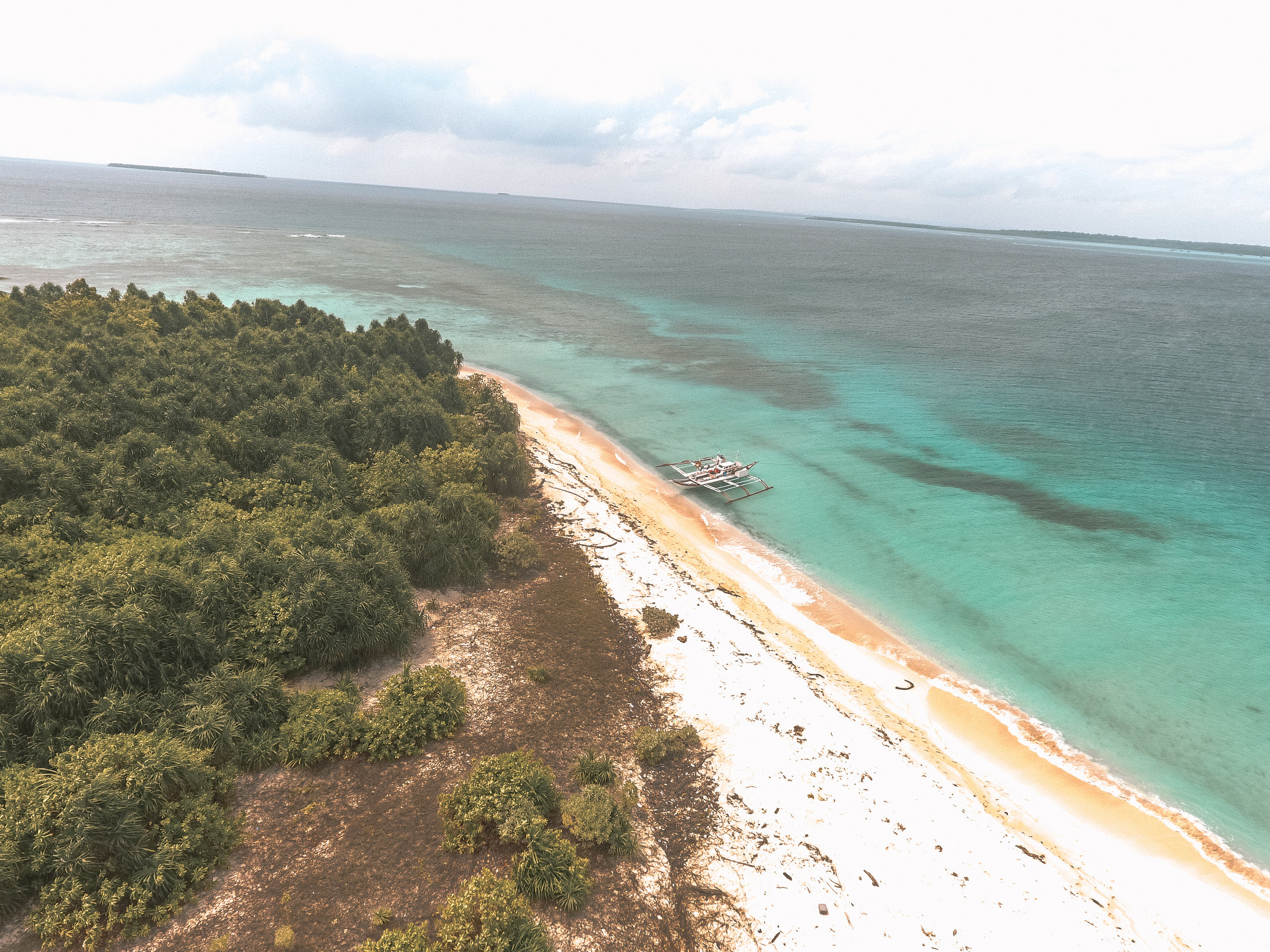 Viewing one of Balabac's many islands from the sky. Photo by Jhasper Reganit.