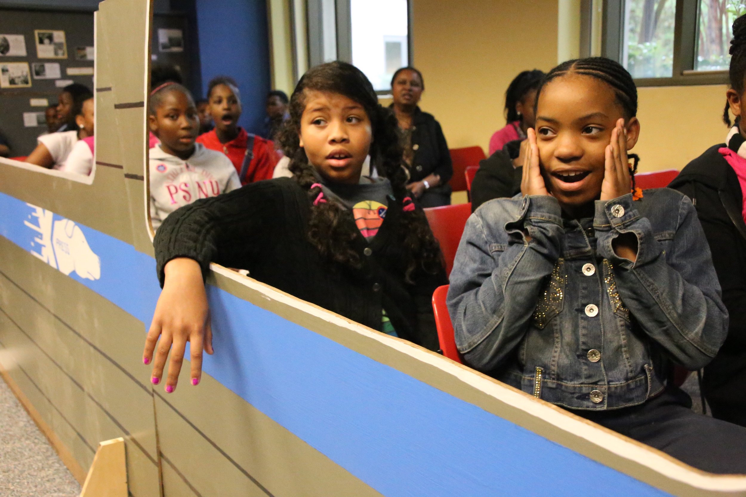 "Fight For Your Rights" school tour, Atlanta History Center. Shown here: Freedom Riders simulation using plywood bus.