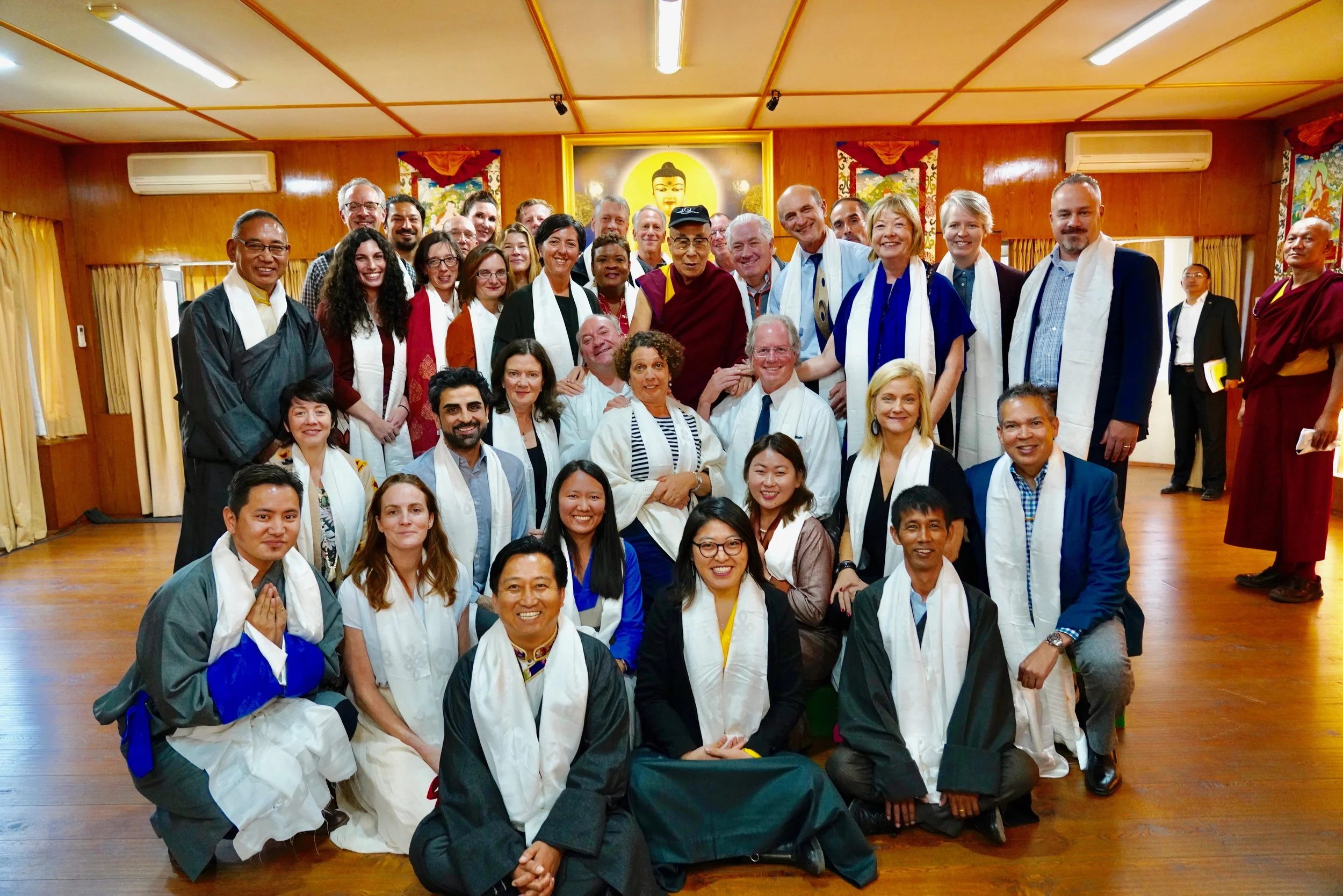 I’m in the back row, right side. The Dalai Lama, center, is wearing a baseball cap that says “San Francisco Ballet” given to him by one of the delegates Danielle St. Germain-Gordon. He loves baseball caps! Who knew?!