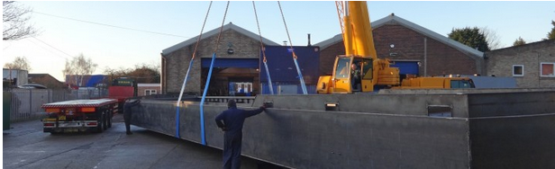 24 Metre floating home hull leaving the workshop