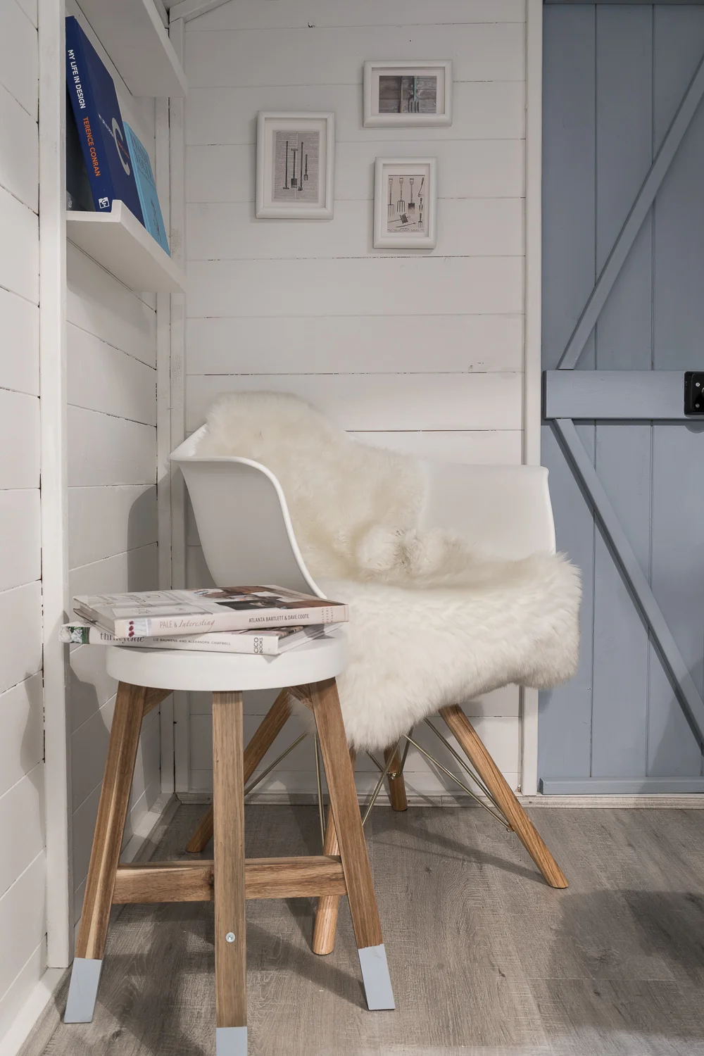 Reading corner with bespoke book shelves and luxury textures
