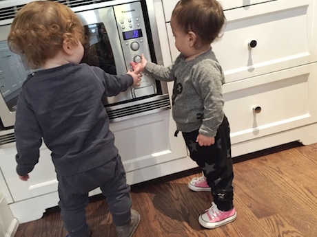 London is wearing Hux sweater, Nununu sweats, & pink Convers