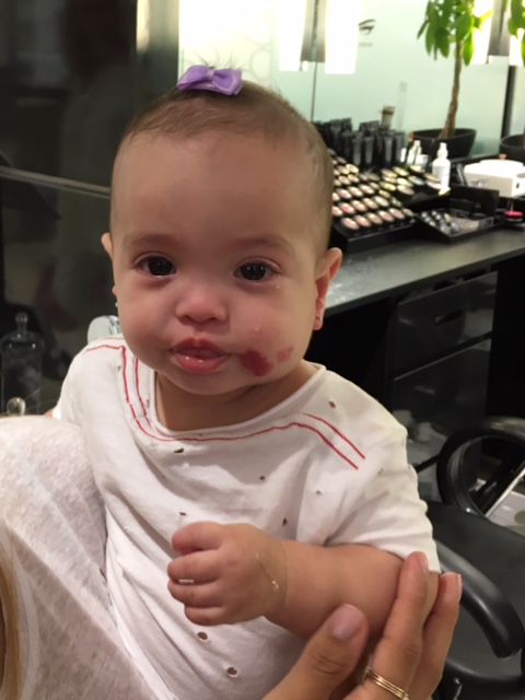 Getting her ears pierced , kills me when she cries :(