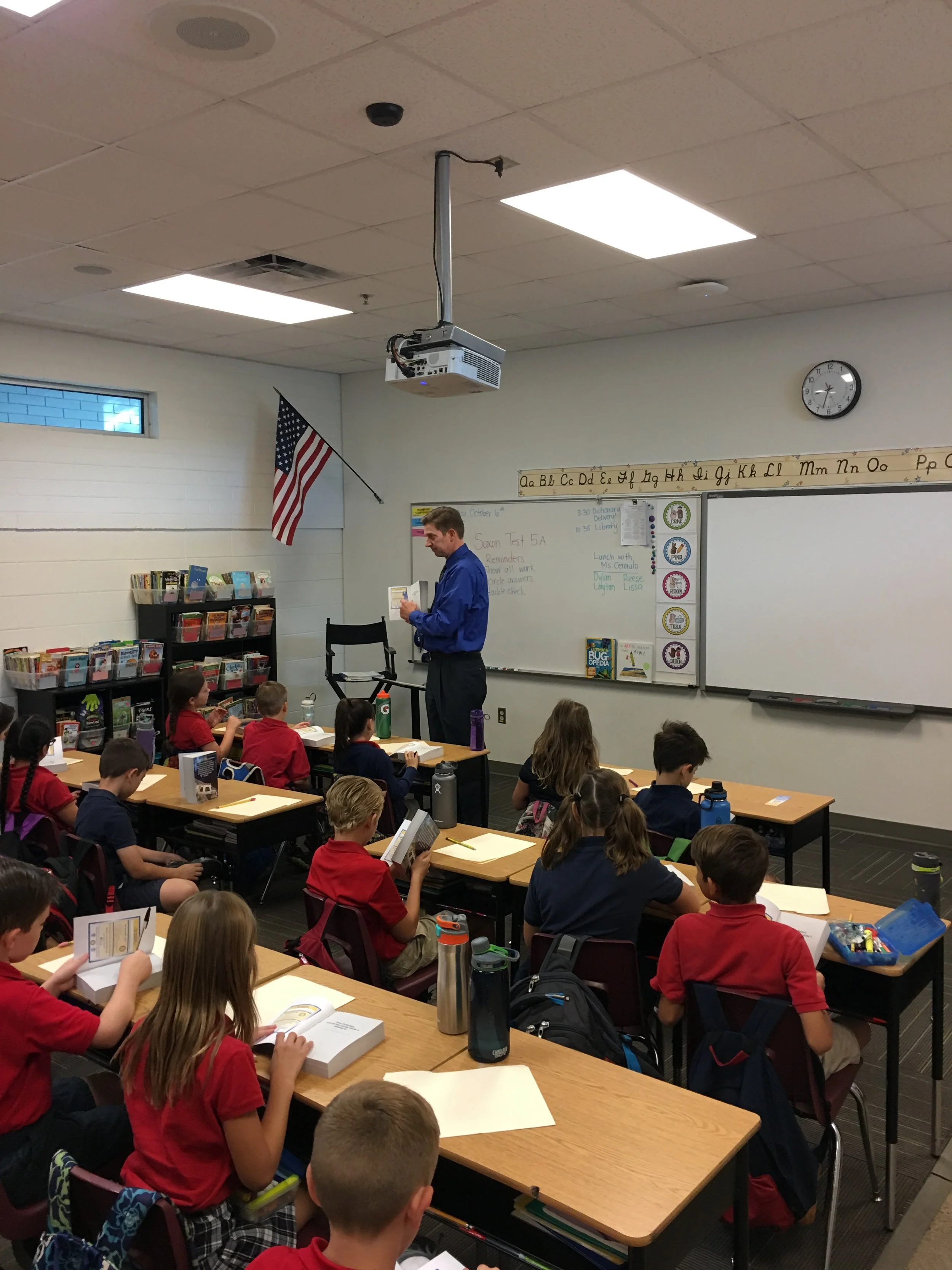  Rotary member Darren is describing the dictionary to third grade students. &nbsp;Each student was given their own dictionary; in many cases this is the students first book they own. &nbsp;We gave out 676 dictionaries this year. 