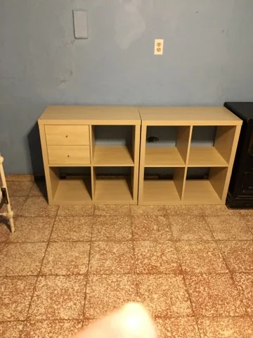 The new shelves missing the cloth baskets