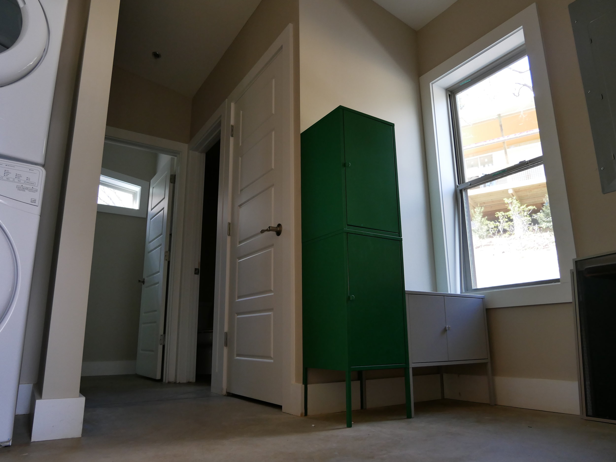 The entry to each cabin has a sort of "mud room" where you can hang up your riding gear and do laundry.