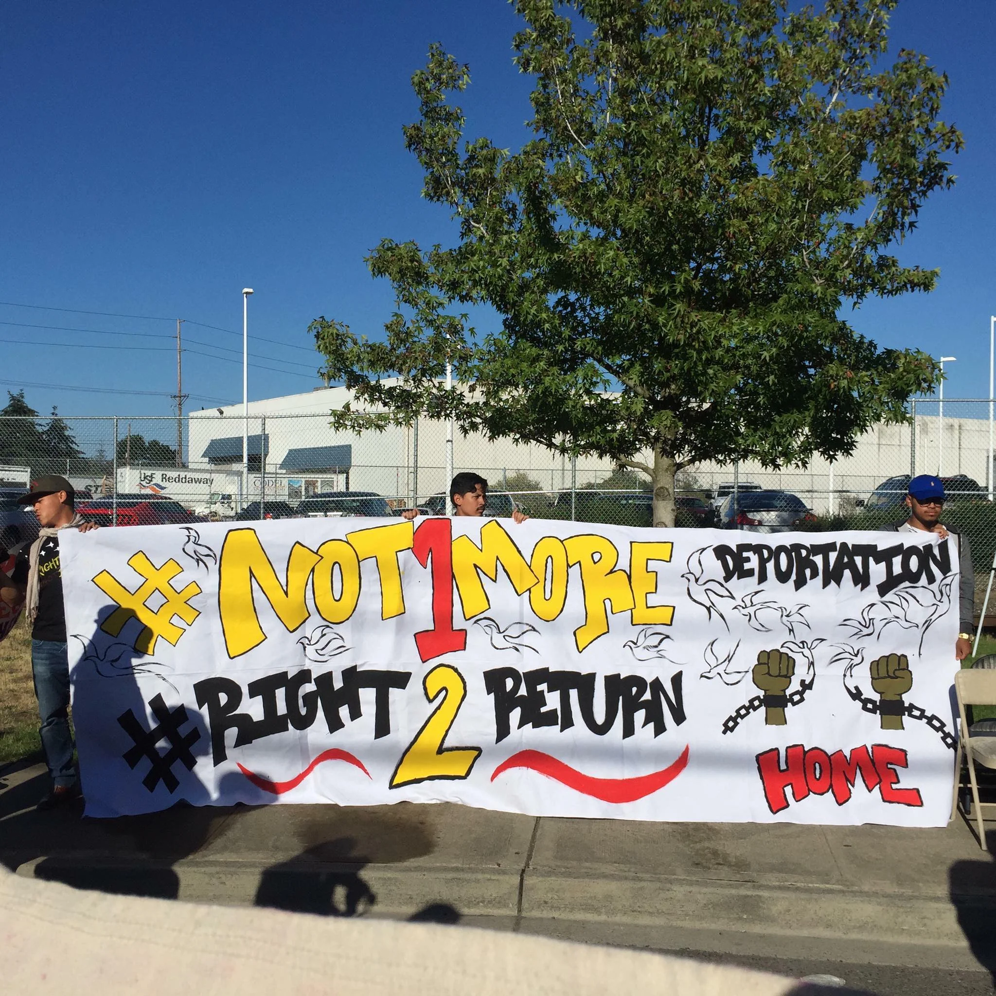 deportation rally banner.jpg