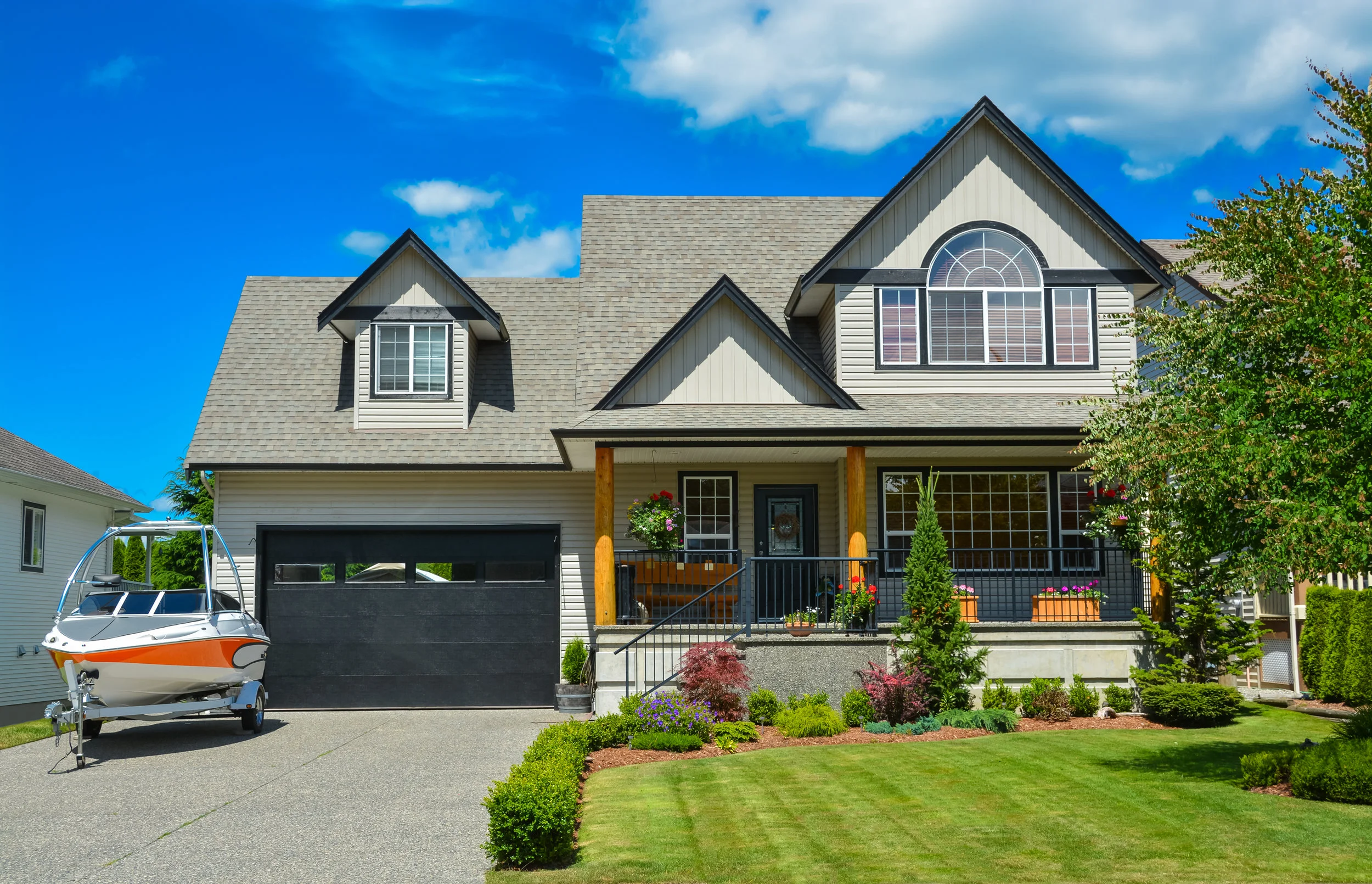 bigstock-Suburban-House-With-Landscapin-279609763.jpg