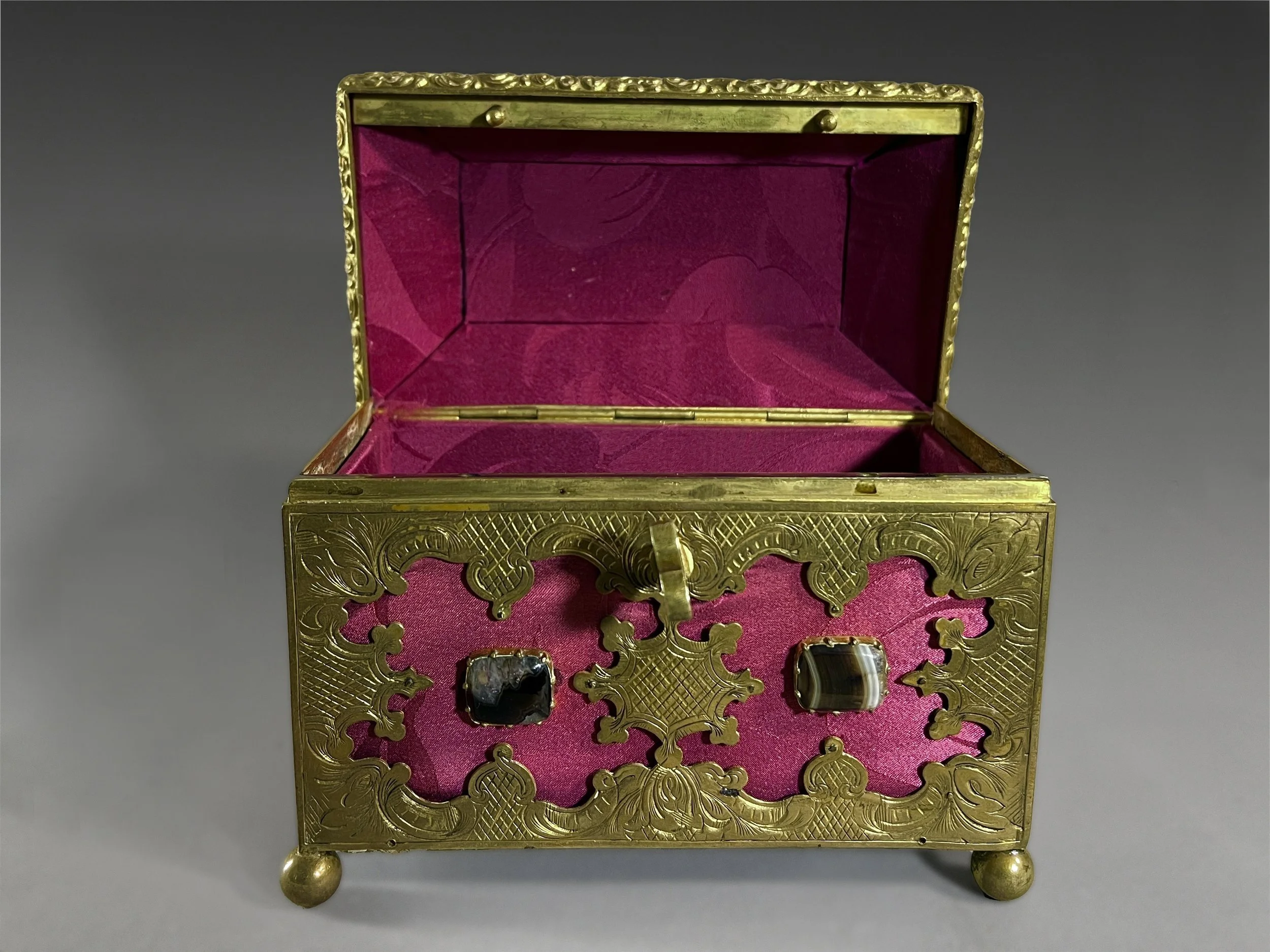 Red silk lined jewelry casket