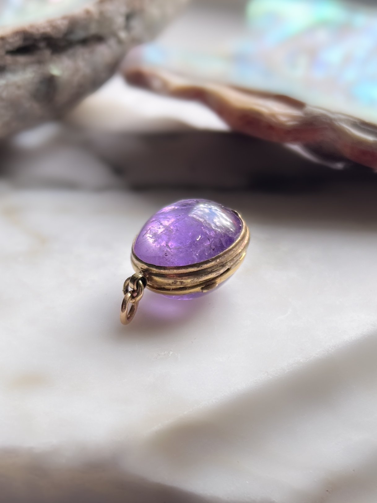 antique amethyst locket.jpeg