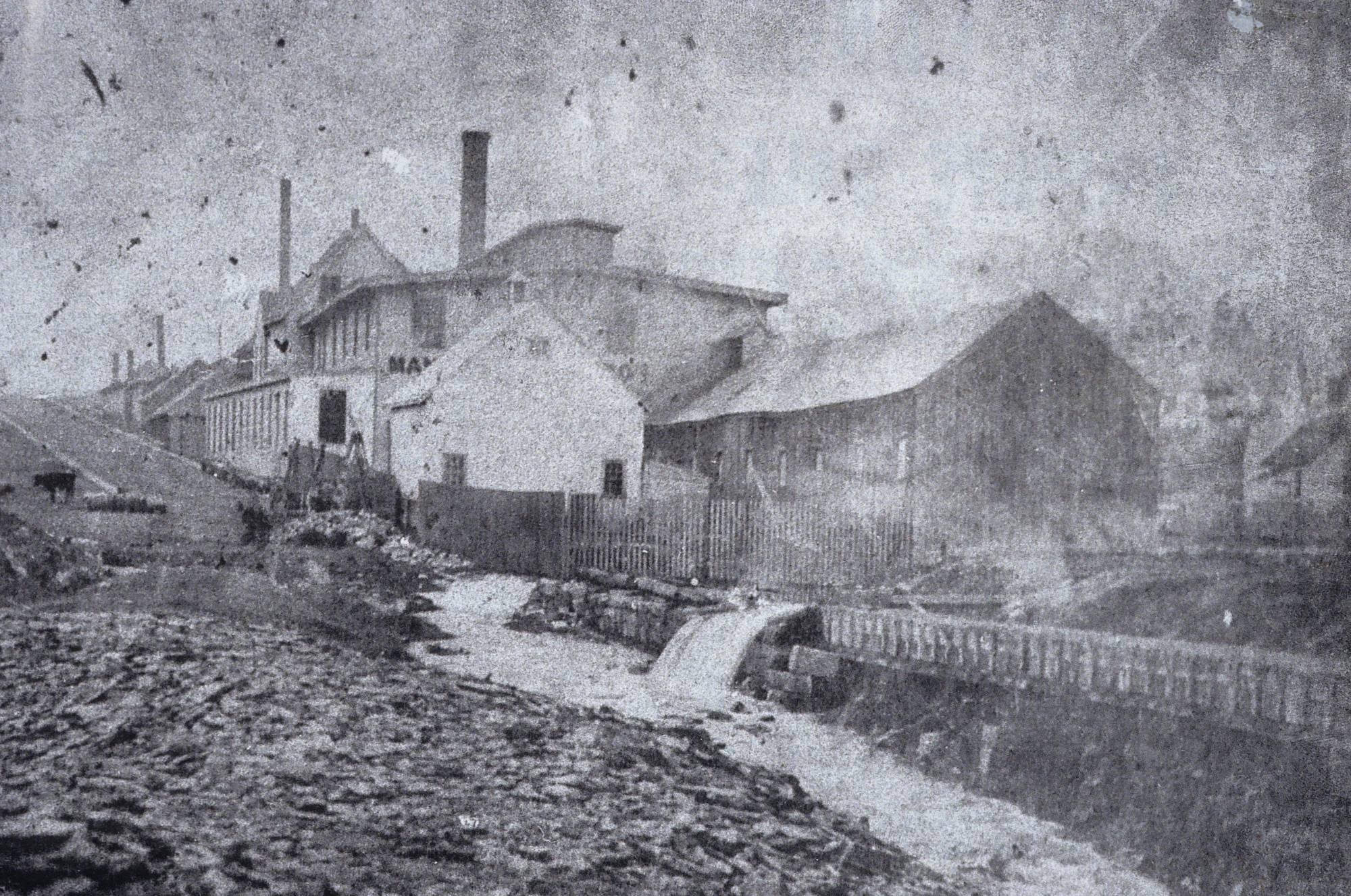 Starr Manufacturing Company visible alongside part of the Dartmouth marine railway. This factory expanded onto the former canal lands and continued to operate until 1996.