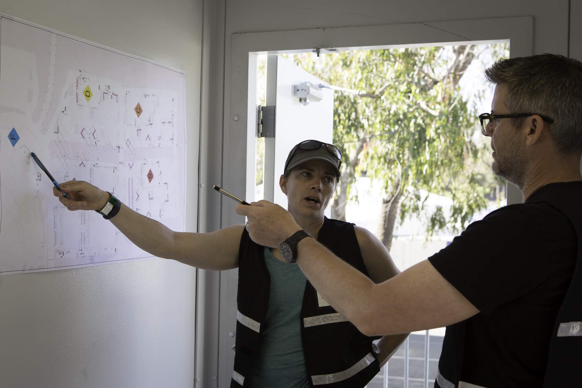 Allyson seen here giving the on site morning production briefing with end of day goals.