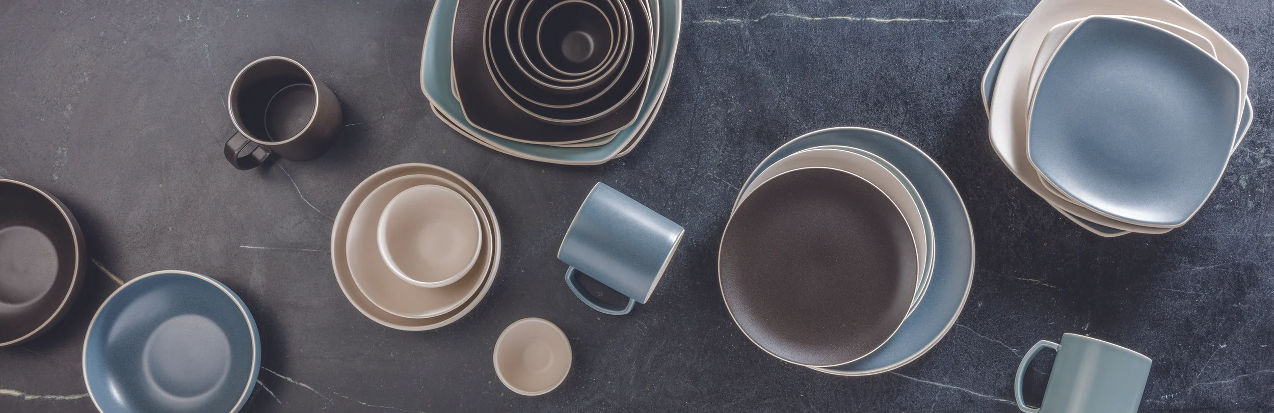 Blue Overhead Ceramic Dishware on Marble Slate