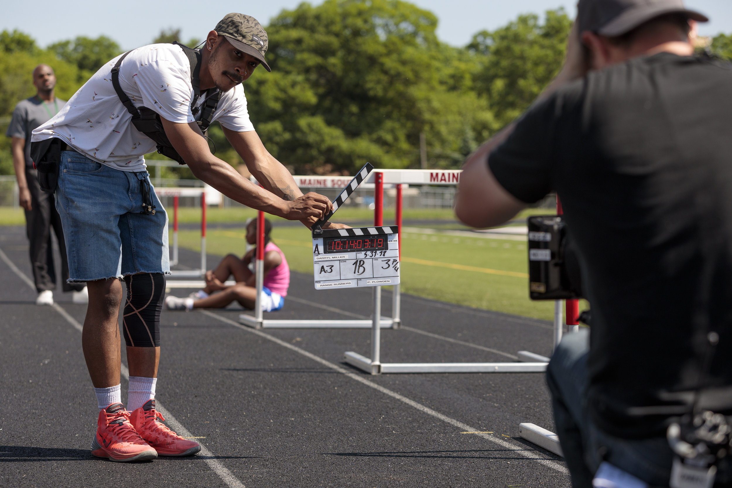  Roderick Reed (Second Assistant Camera) slates a scene.  Photo credit,  Steve Serio . 