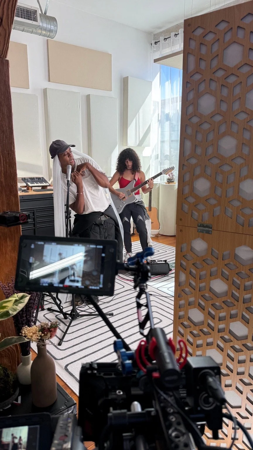 A camera crew filming Parrka* and musicians in the Silver Gun Records studio