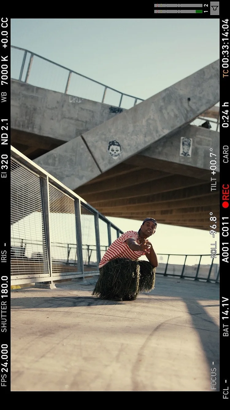 Parrka* in a low-angle outdoor shoot frame