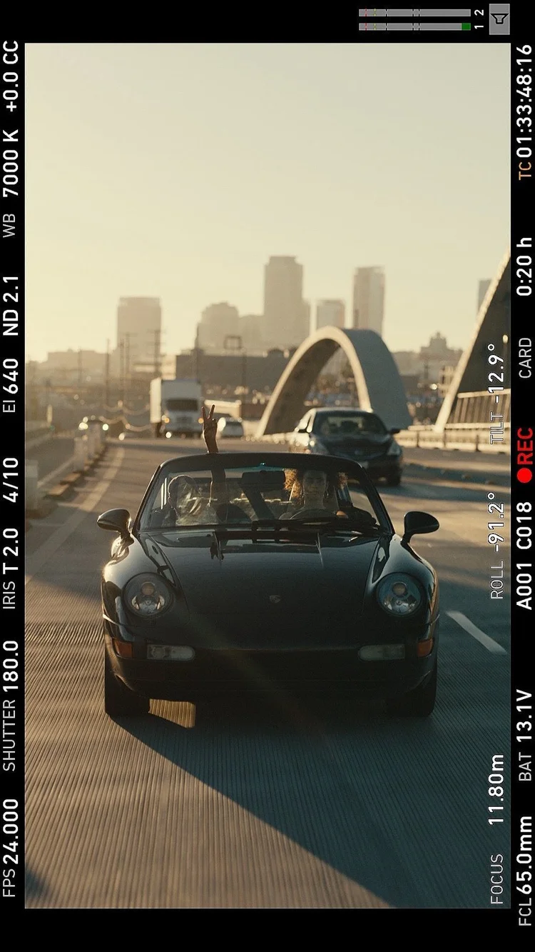 Car and bridge skyline in warm evening light