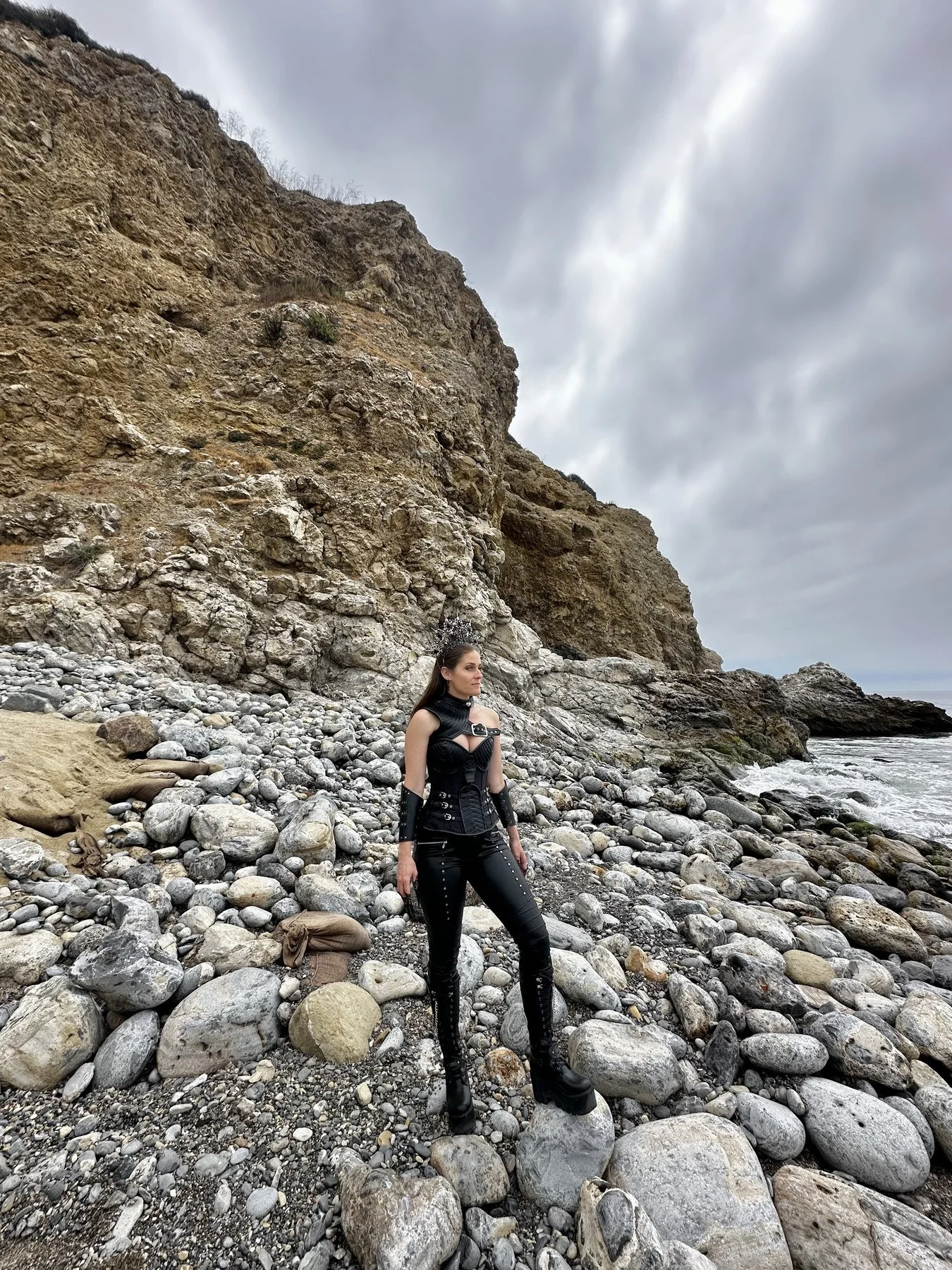 Moana Avvenenti in her cinematic Dragonita styling on a rocky coastline