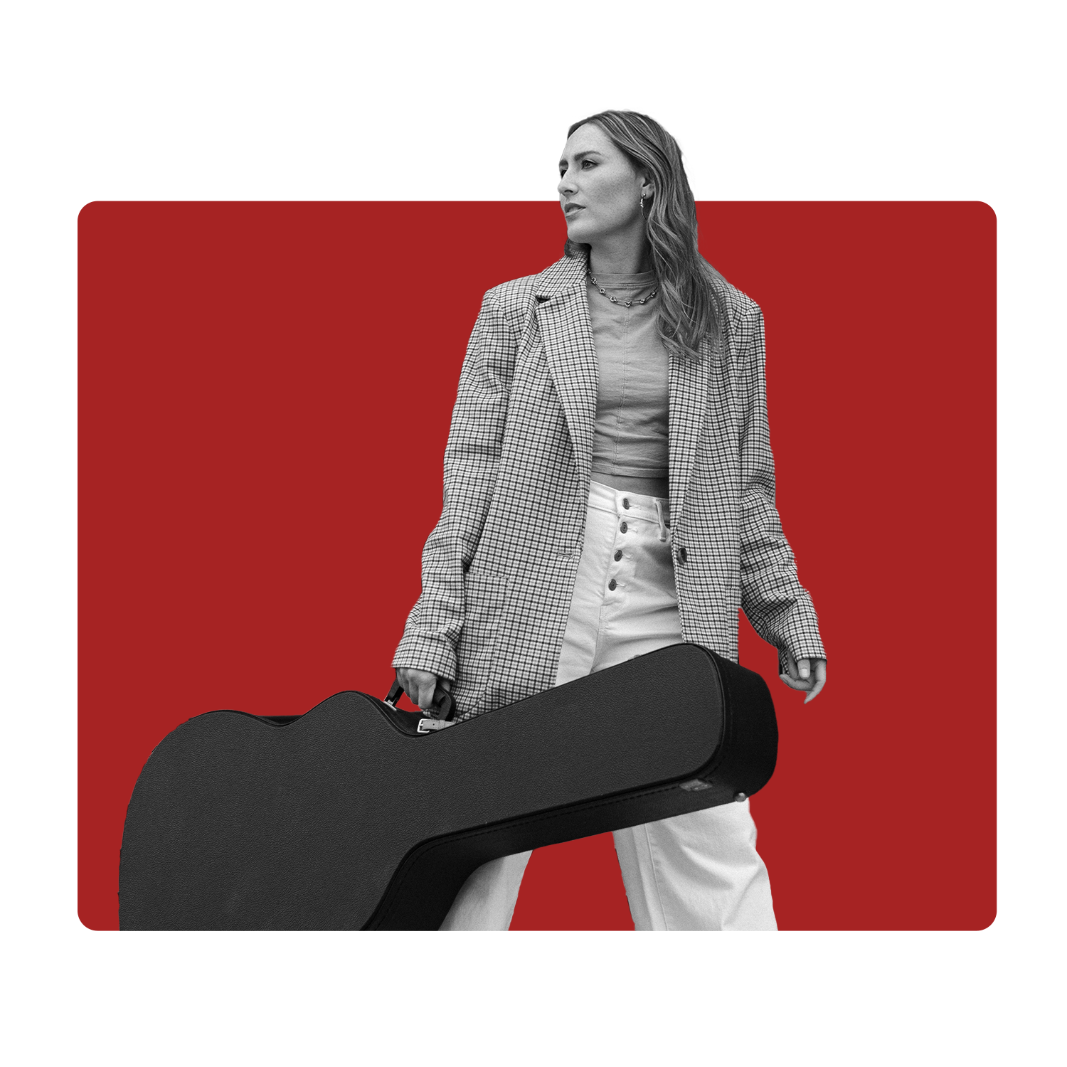 A Female Artist Holding a Guitar Case and Looking Into The Distance