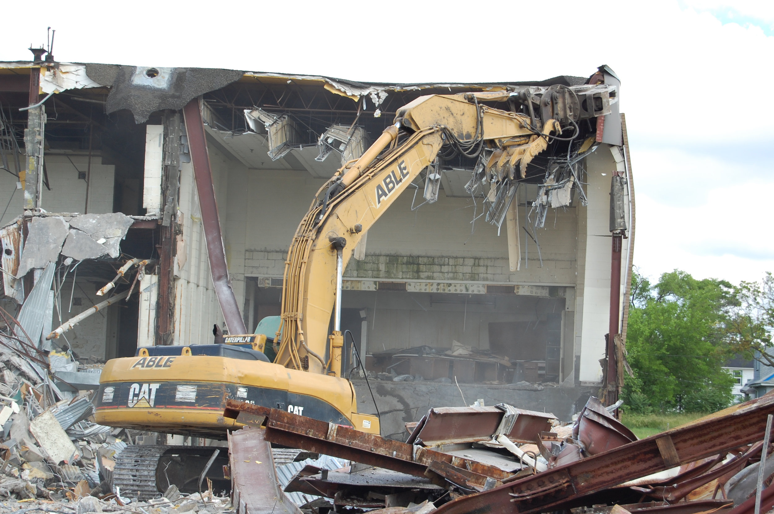 COMMERCIAL DEMOLITION Commercial buildings ranging from under 1000 square feet to 50,000 square feet and above, Able Demolition can do it all. We offer total structural demolition that will meet your needs if you need to leave or remove the basement or concrete slab, certain back fill and grading requirements, and site finishing options. Give us a call or email to let us help you come up with the best approach to your demolition project.