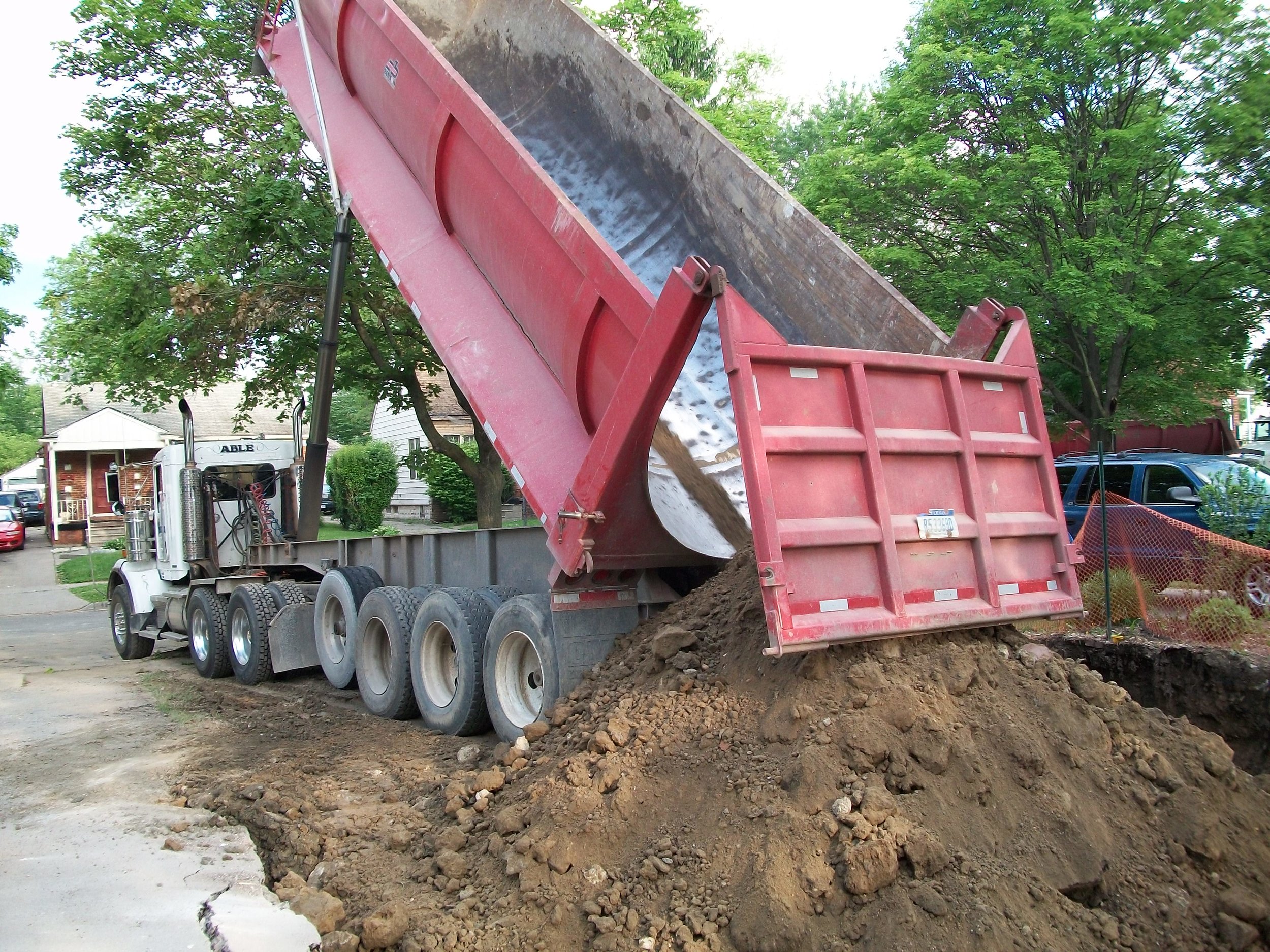 TRUCKING Our trucks can haul anything from debris to concrete to fill materials, if you need anything removed off your site, we would like to help. While our trucks are running constantly, we take the appropriate measures to keep our trucks running for a long time.