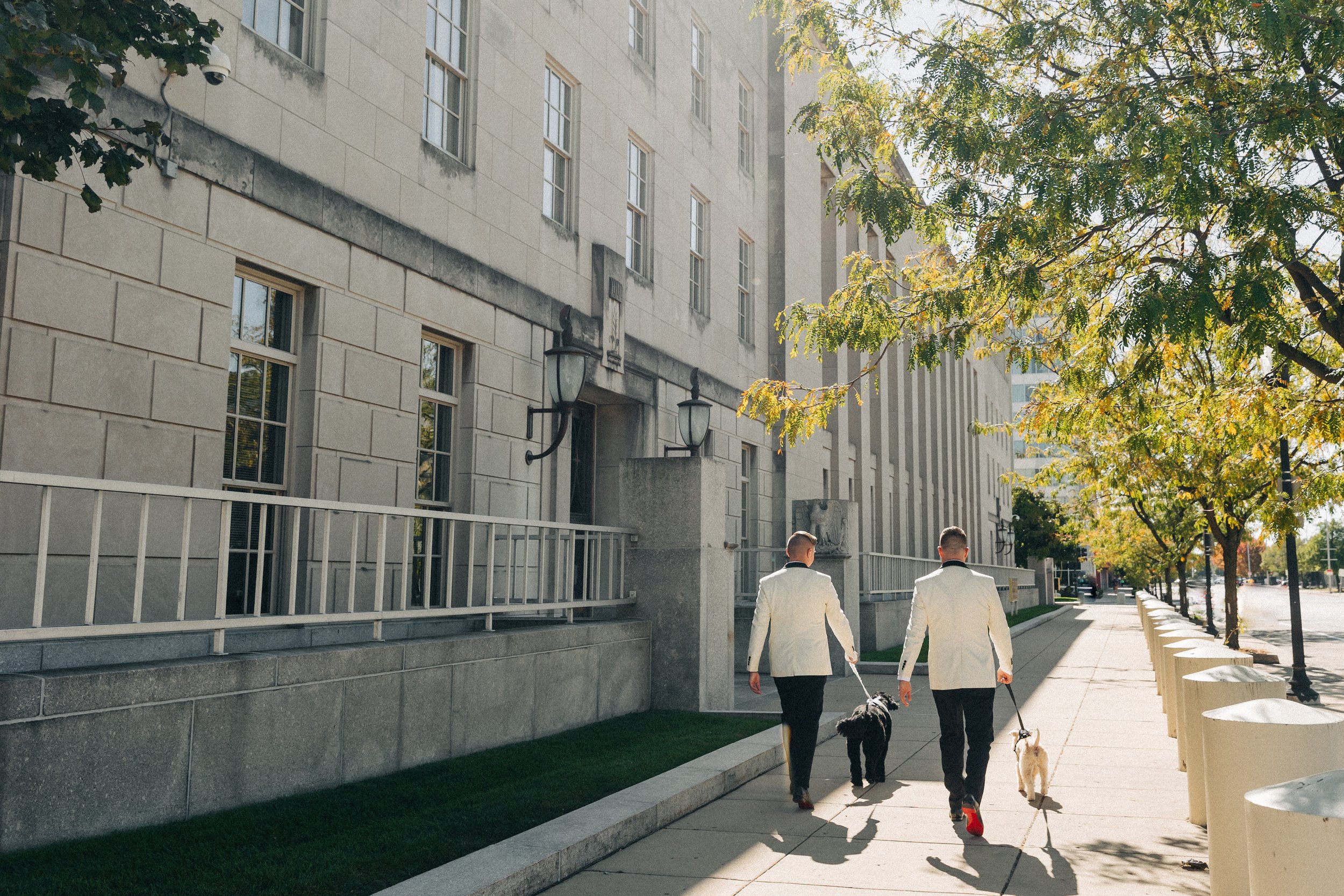 Groom and groom walking downtown Peoria Illinois