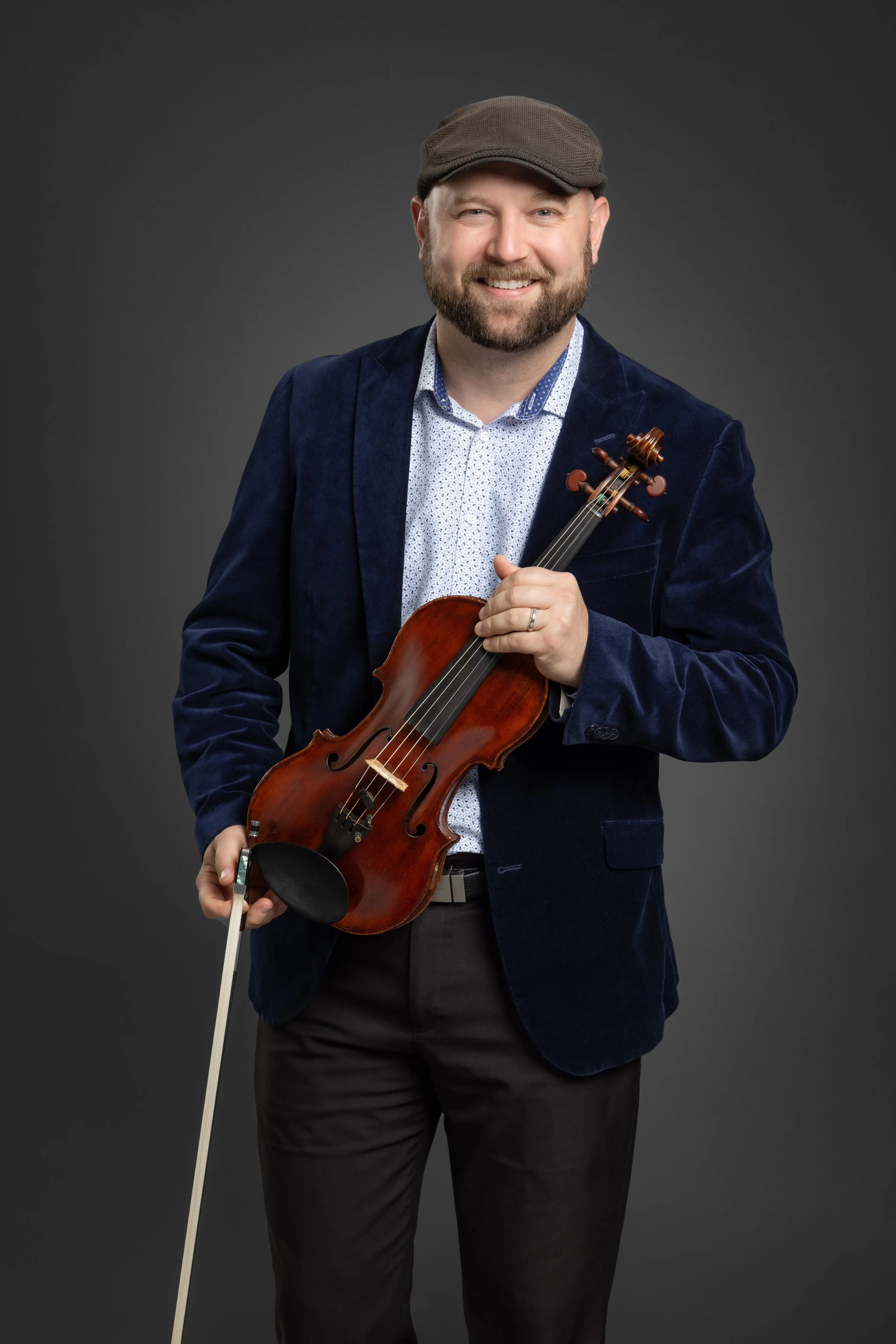 Brandon_Headshot_2025 (Holding violin with hat)447-Edit.jpg