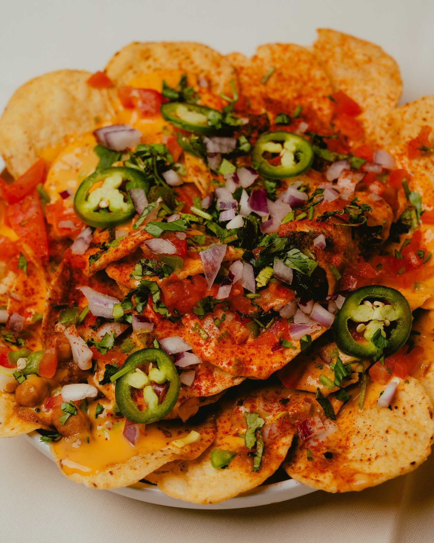 Don&rsquo;t sleep on our live station this weekend featuring Indian inspired Super Bowl sliders and nachos! 🇮🇳🏈