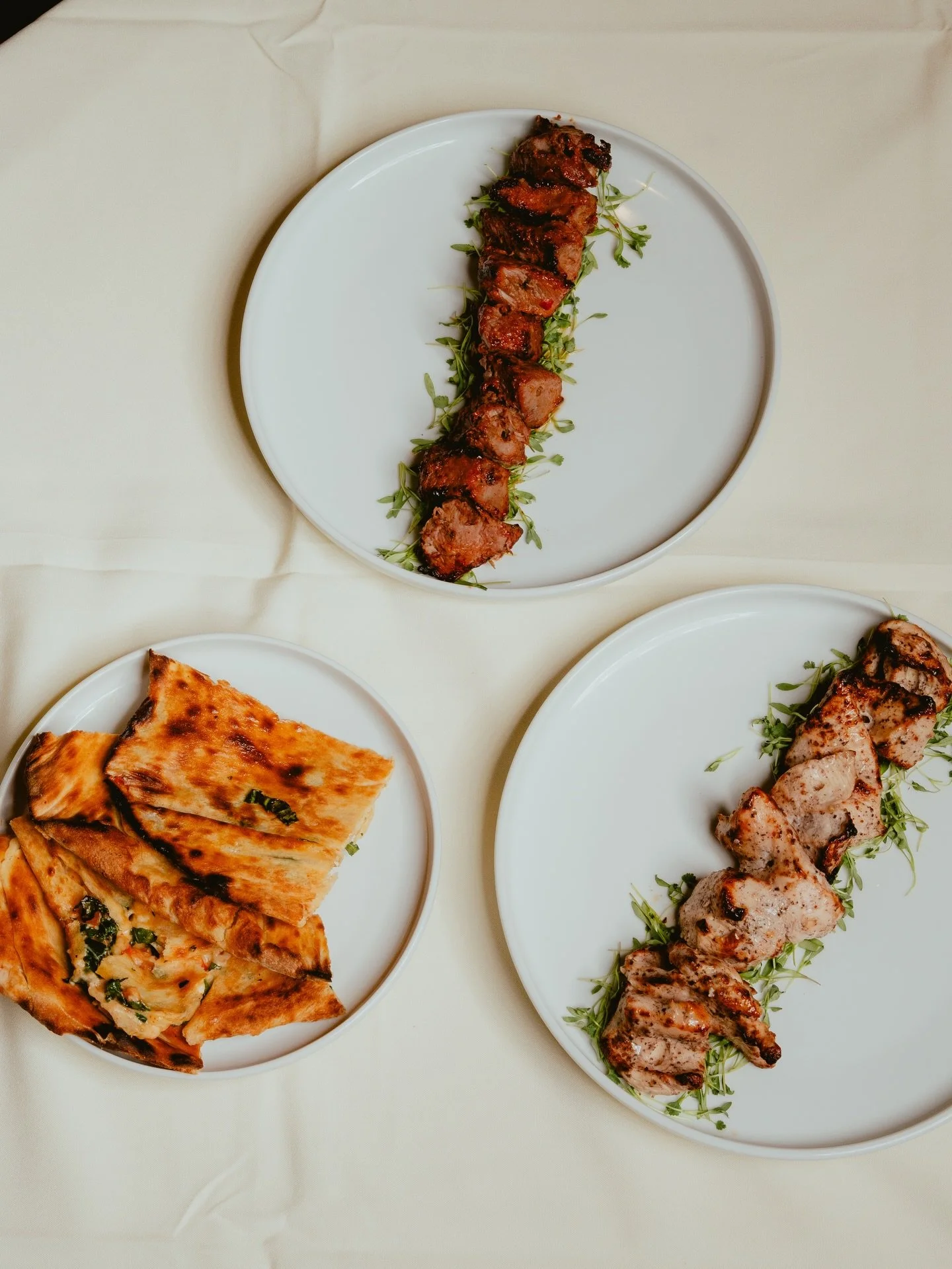 Stuffed naan and perfectly cooked meats from our tandoori oven for dinner just hits different 🇮🇳