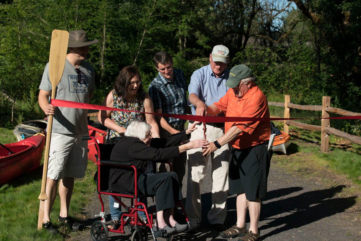 Officially open: Community leaders & former residents cut the ribbon