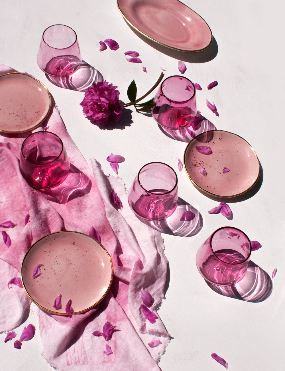 suite-one-studio-peony-pink-glassware-with-peony-petals-and-oval-platter-in-rose-with-gold-and-dessert-plates-in-rose-with-gold-splatter-vertical.jpg