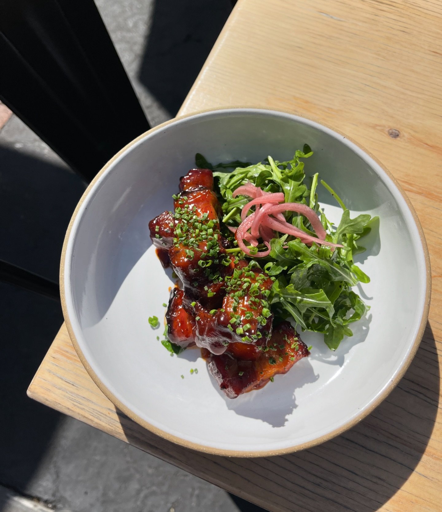 Pork Belly Burnt Ends 
Flash Fried Marinated Pork Belly, Barbeque Sauce, Pickled Onion, Arugula 🌱

Our Hours: 
Mon-Thurs 3-9pm.
Fri-Sat 12-10pm.
Sun 12-9pm.

See you here. 🌙 
&bull; Reservations via yelp, link in bio, phone call or in person. Walk-