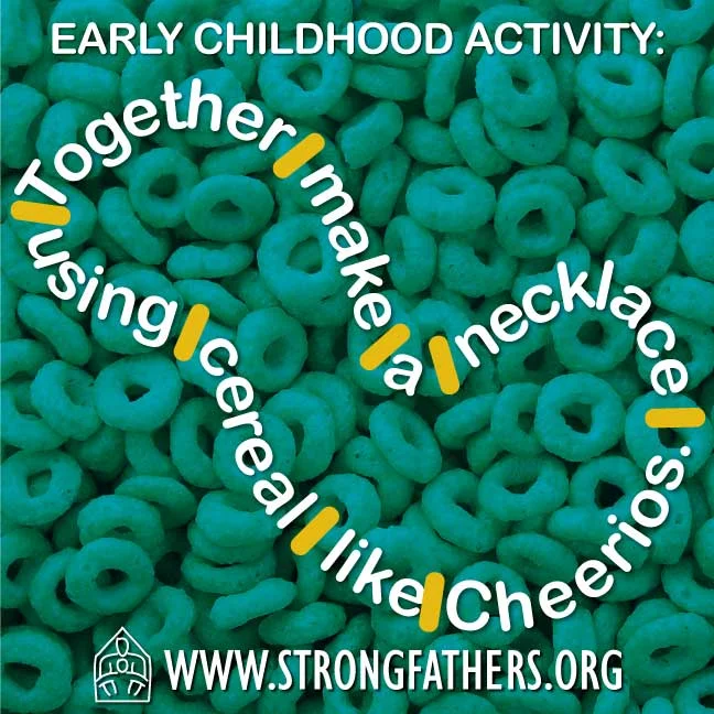 Dads, together, with your young child, make a necklace using cereal like Cheerios.