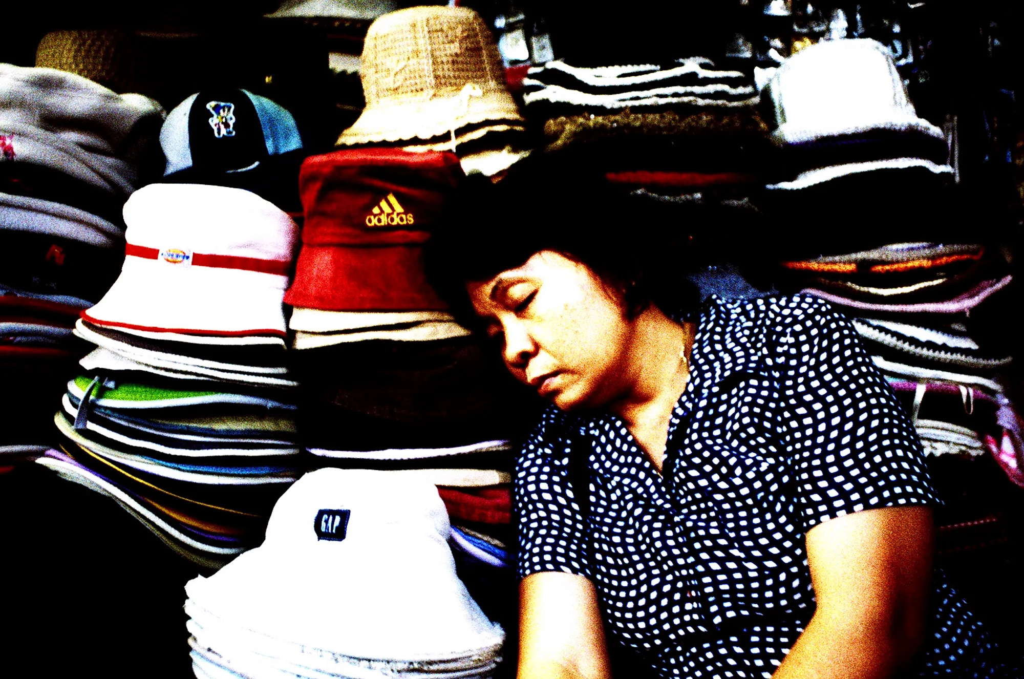 Asleep in the New Market. Phnom Penh, Cambodia. 2005.