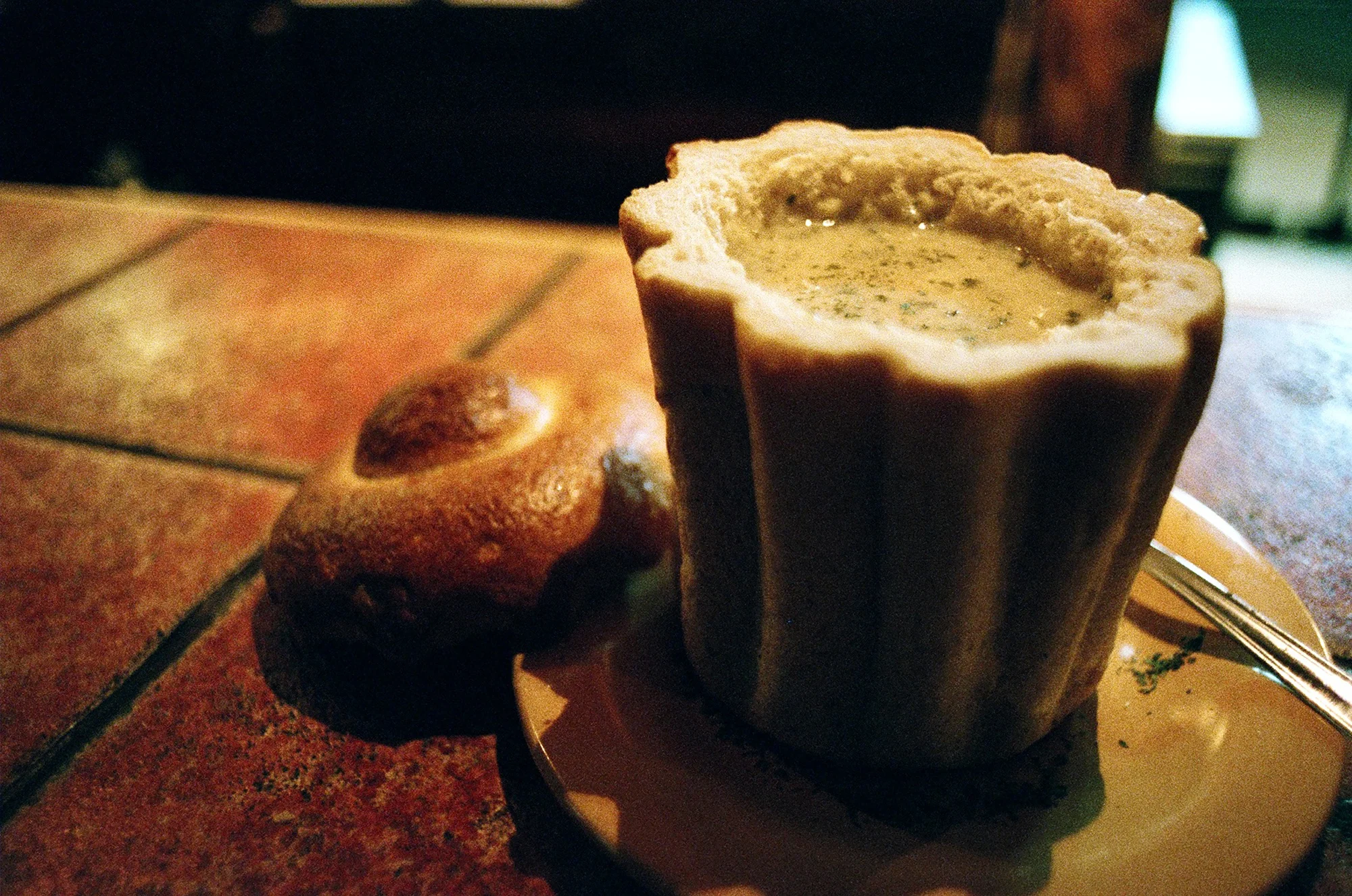 Mushroom Soup served in bread. Zakopane, Poland. 2005.