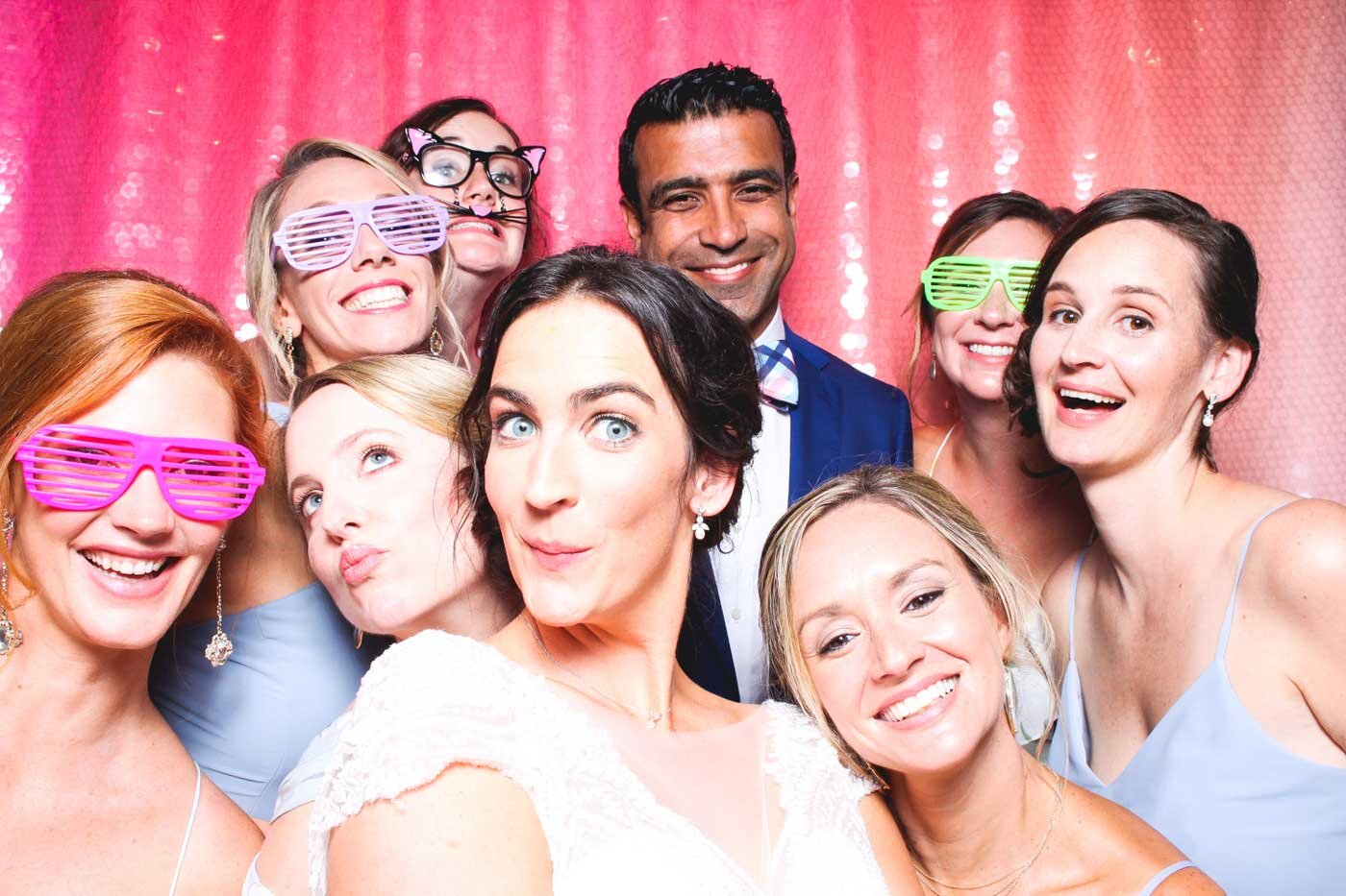 pink-ombre-photo-booth-backdrop-at-raleigh-wedding.jpg