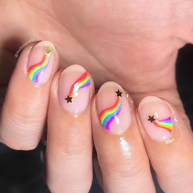 Negative space #pridenails using several shades from @orly and stars from @cirquecolors 🌈🌟 #loveislove .
.
.
I took some time off from this account and from nails in general to focus on what feels like a million more important things, but today I t