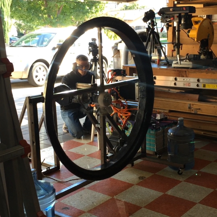 Me running a test on the rig (the propeller can't be seen because it's spinning so fast)