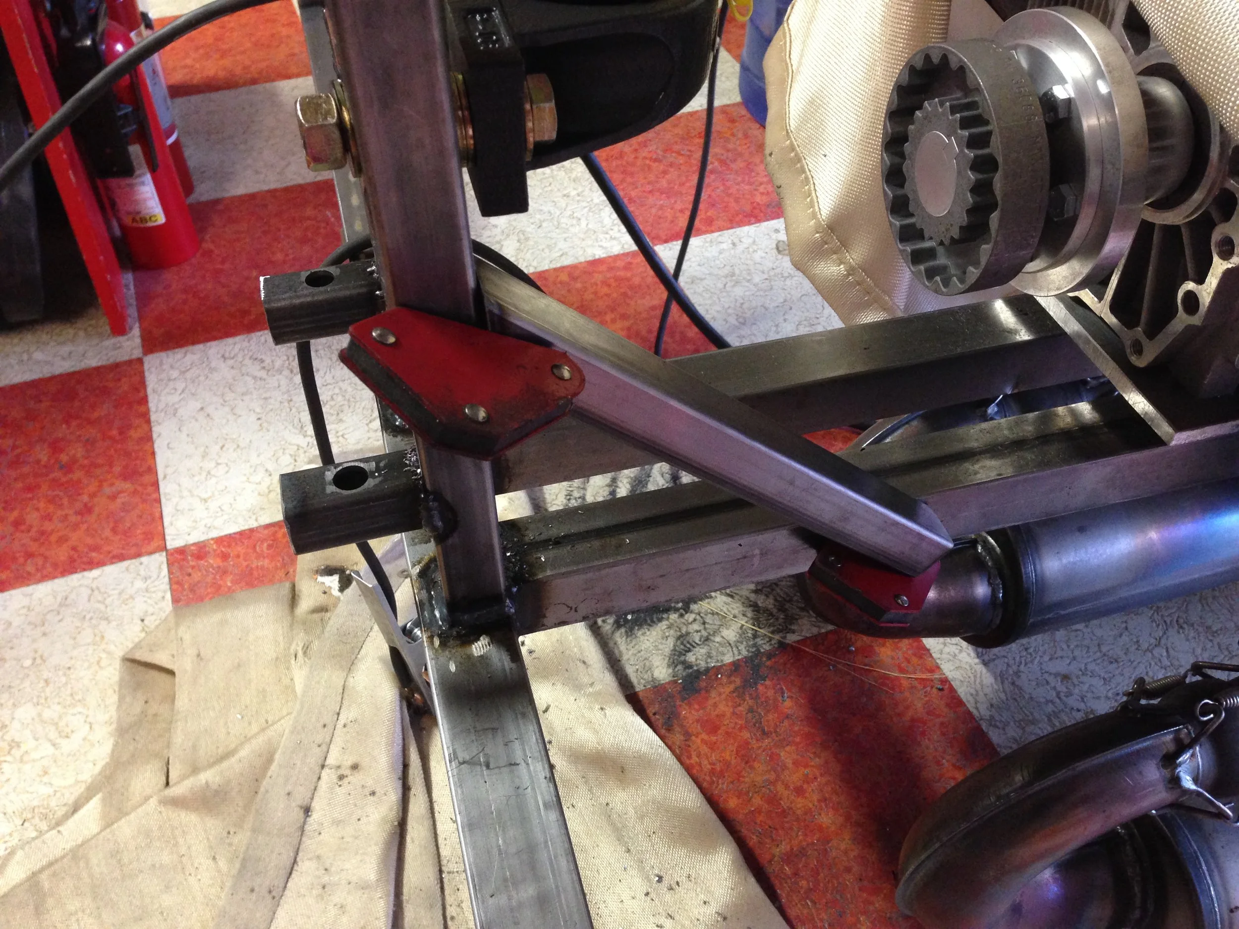  Those magnets hold the bar in place as it's being welded 