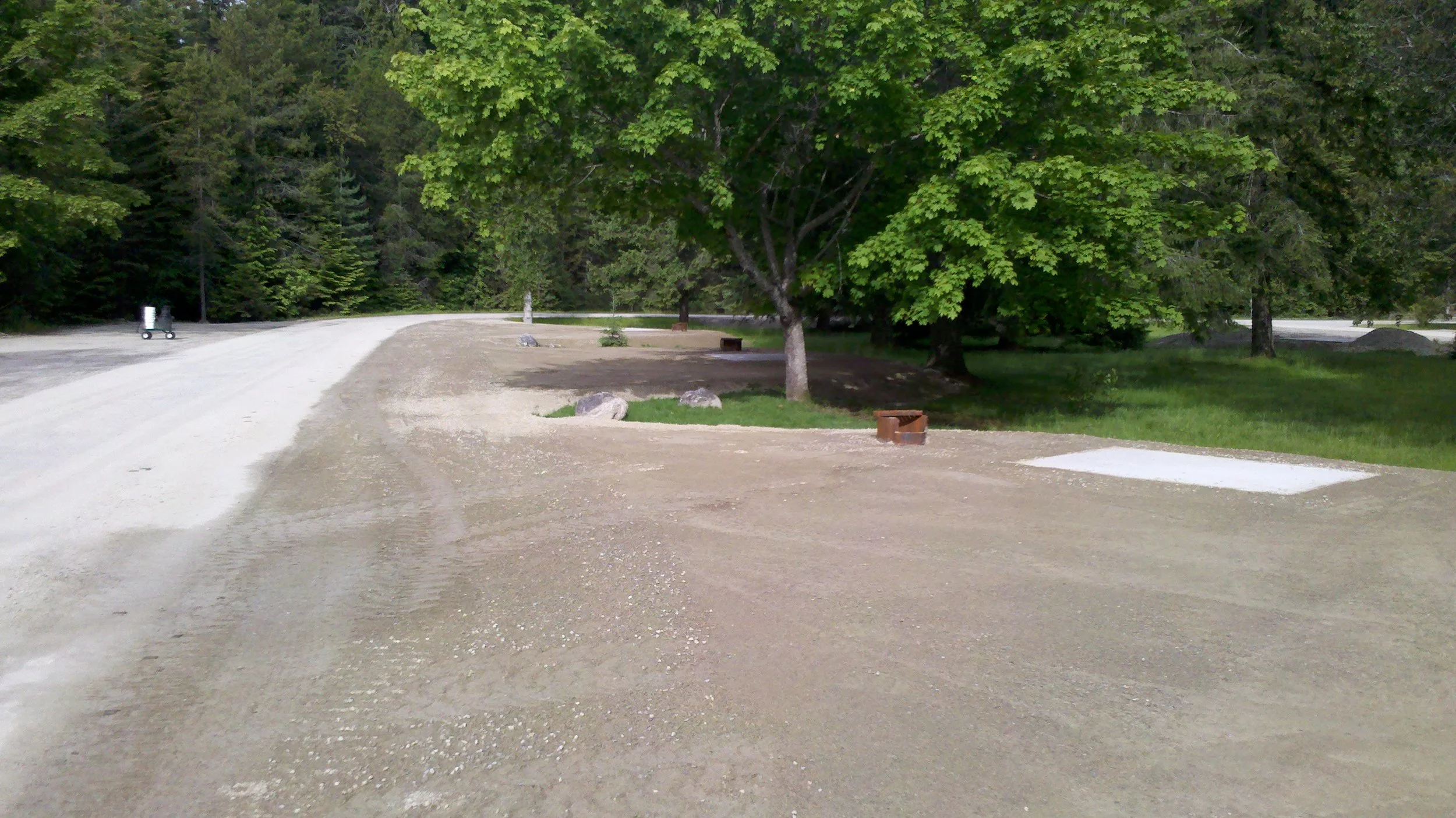 ROAD GRAVEL LEVELLED AND GRADED WITH EXCAVATOR BLADE.... NO OTHER MACHINE REQUIRED...