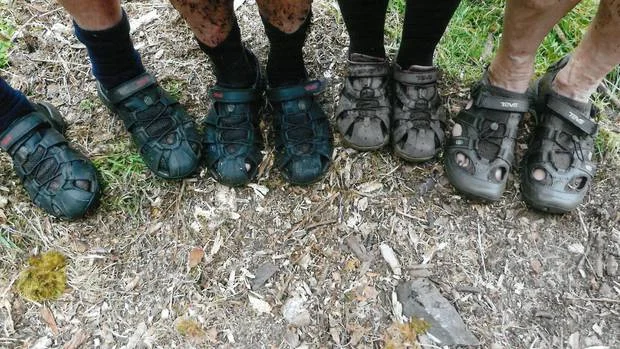 The feet have it: Wanganui Tramping Club show off their sandals after wearing them over the infamous Dusky Track in Fiordland National Park.