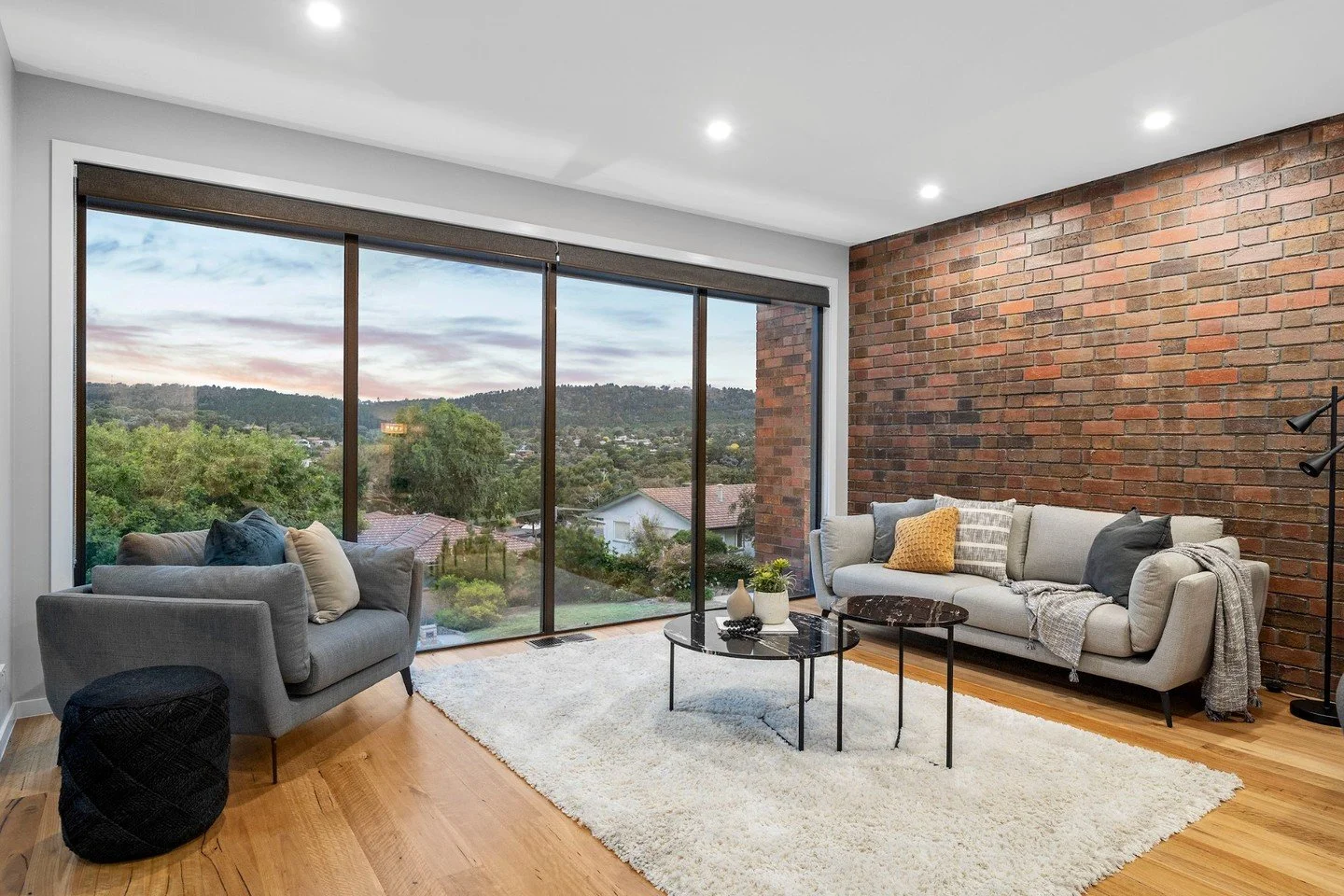 A highlight of this beautiful home developed by Dan and Emma D'Ambrosio, this stunning feature wall uses Krause Bricks in an Old Melbourne Town blend to anchor the living space. The deep reds and char tones provide a rich sense of history, creating a
