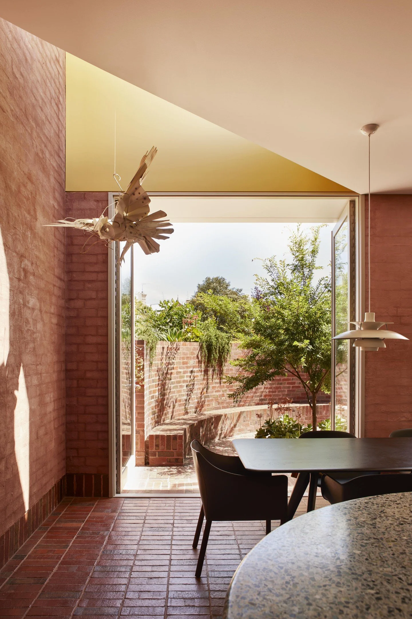 A stunning material moment inside Ararat House by Adam Haddow of @aboutsjb.

When renovating his parent's home in 2024, Adam chose Krause Pressed Red Blues for their incredible warmth and depth. The bricks and matching paving tiles create a beautiful