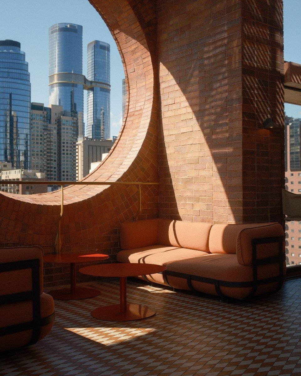 The rooftop terrace at @hydemelbourneplace offers a stunning city vantage point through its distinctive circular masonry features.

Designed by @kennedy_nolan, the award-winning hotel features Krause Bricks in a Light Grampian Blues blend. They catch