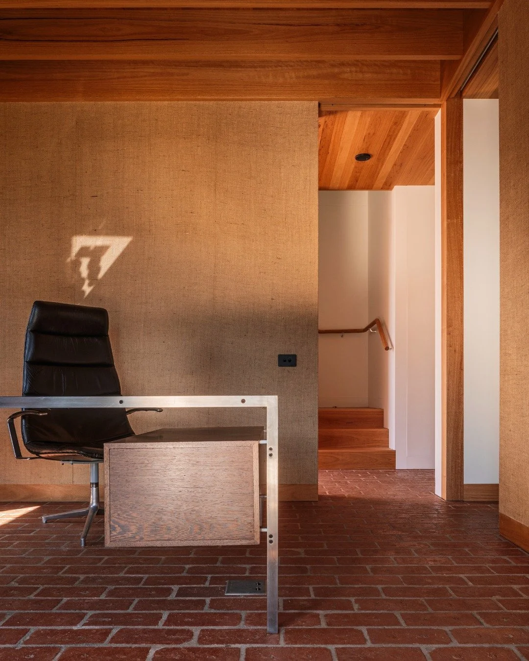 At 'Apple House', Krause Standard 76mm Pressed Bricks in Heritage Red are brought inside to create a warm, durable foundation for the home&rsquo;s mudroom and study. Laid as flooring, the bricks offer an immediate sense of permanence and connection t