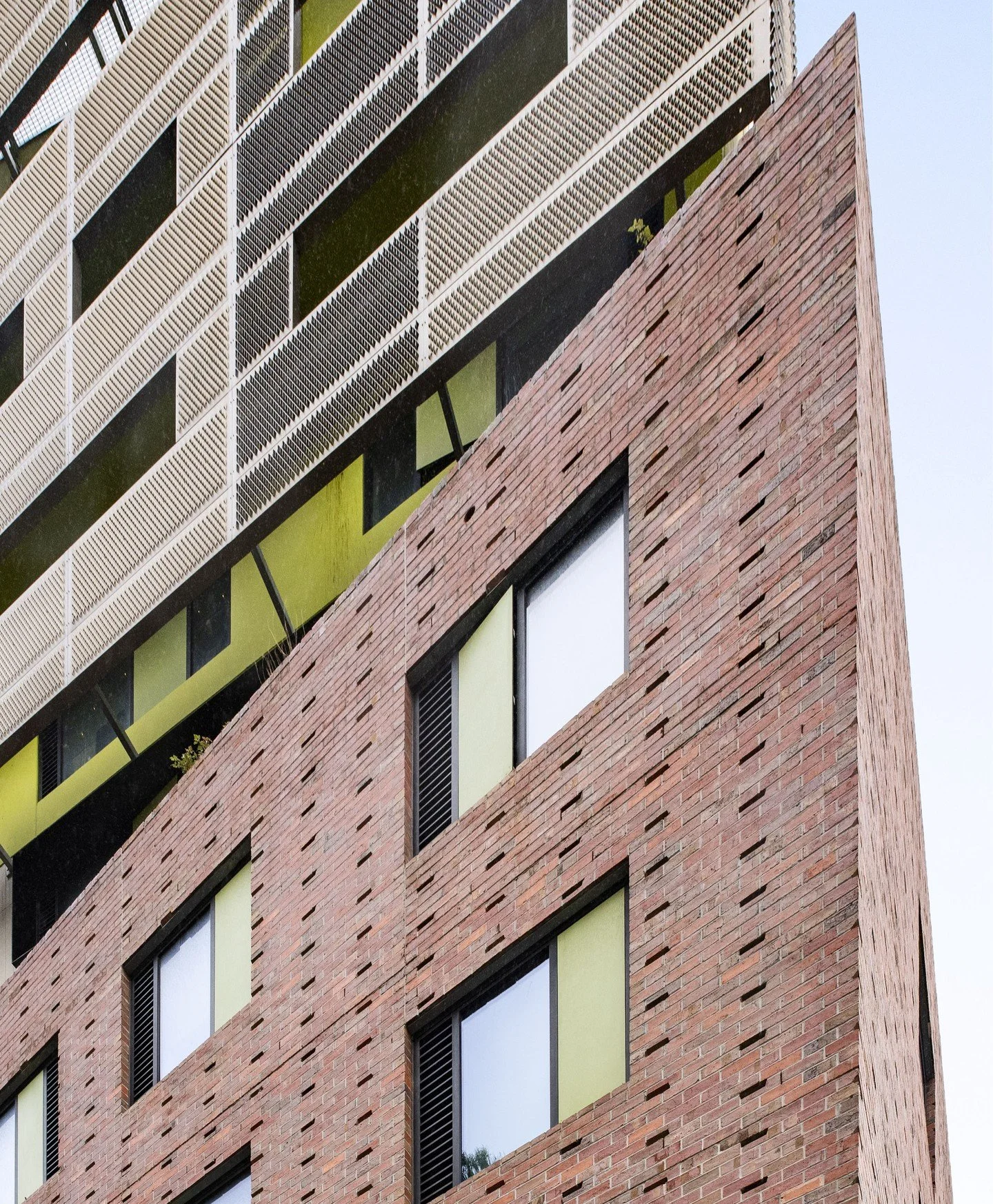 A striking study in texture and geometry at Ozanam House, Vincent Care&rsquo;s flagship facility in North Melbourne.

Designed by @mgsarchitects, this world-class development features a stunning podium of Krause Red Blue Bricks and Brick Tiles. The t