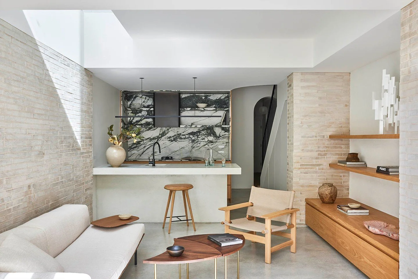 Textured Krause Bricks in Ghost bring a soft materiality to this cosy living space, providing a neutral yet tactile backdrop for the timber and stone details.

Architecture and Interiors: @studioarkive
Builder: @robertplumbbuild
Photography: @_pablov