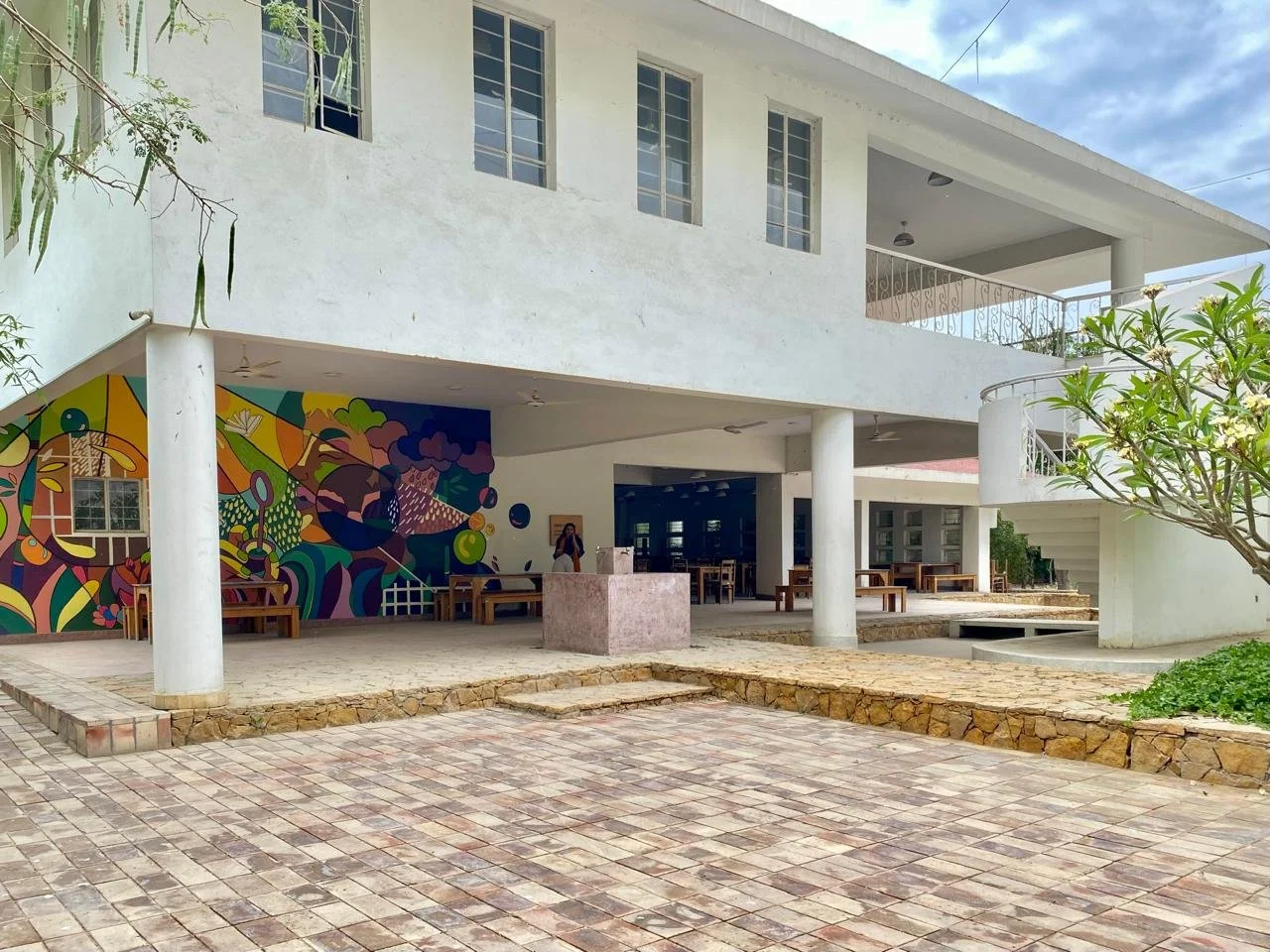  Porch at the Commons Building with a mural by Fine Arts students from the Indus Valley School  